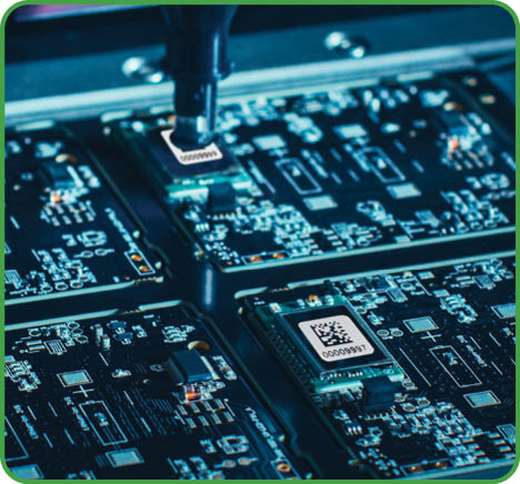Macro Close-up Shot of Printed Circuit Board on a Factory Assembly Line with Automated Robotic Arm for Surface Mounting Microprocessors to the Motherboard 